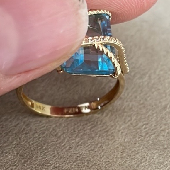 Sky Blue Topaz and Diamond Crisscross Ring in 14kt Yellow Gold. - Picture 7 of 8